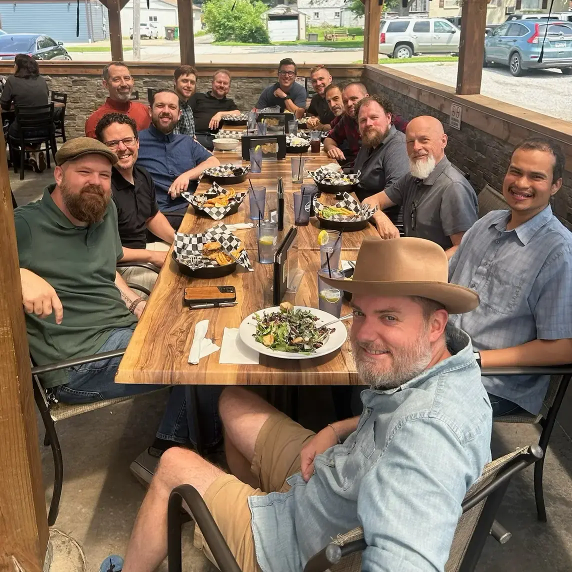 picture of men eating lunch together